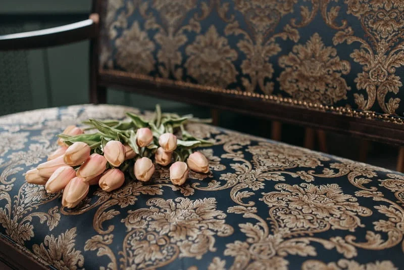 Memorial chair with pink roses on it. Plan a Memorial Service at Home